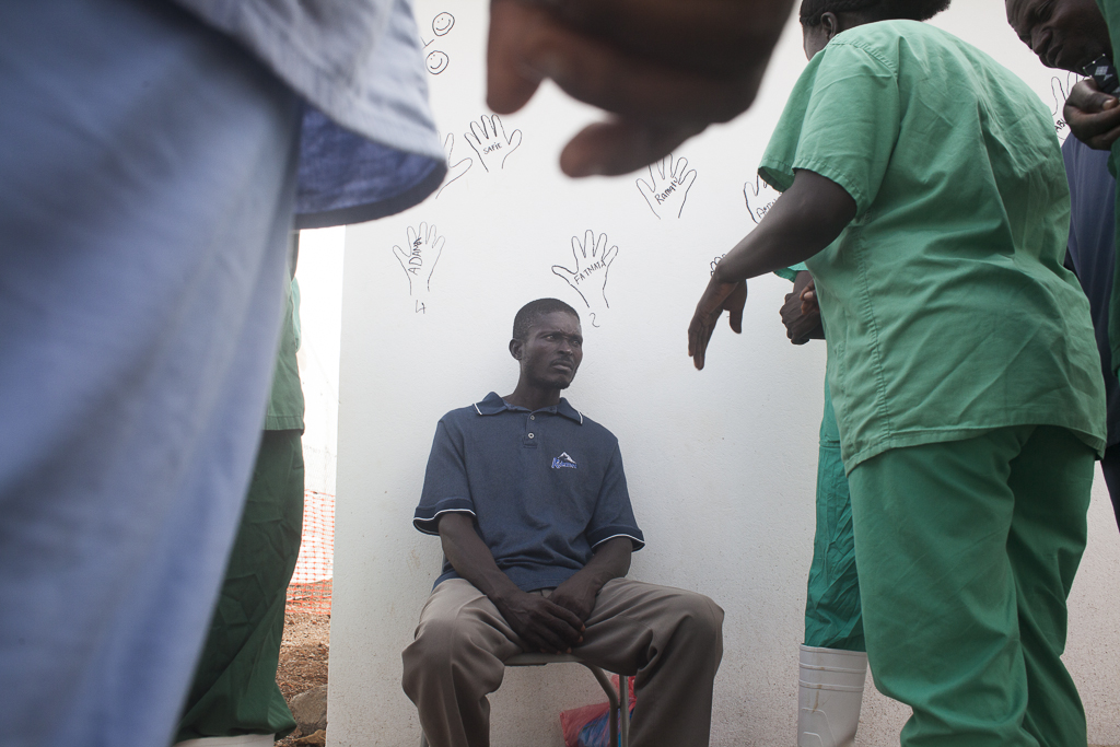 Abu Bakar, first male ebola survivor in Moyamba district in front of the 